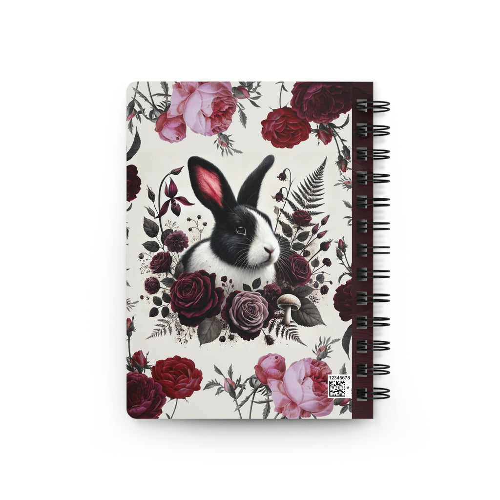 Back of Notebook with a rabbit and floral design on the cover