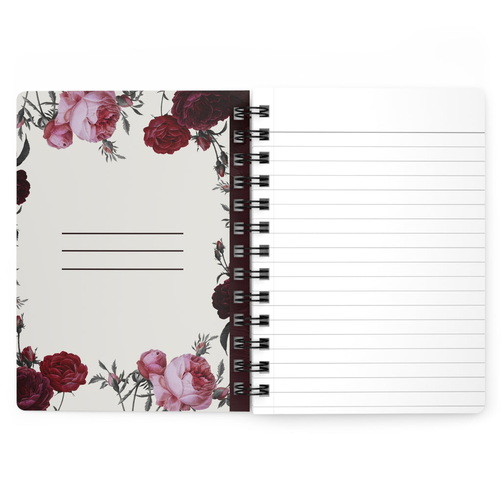 Inside cover of Notebook with floral design on the cover and lined pages.