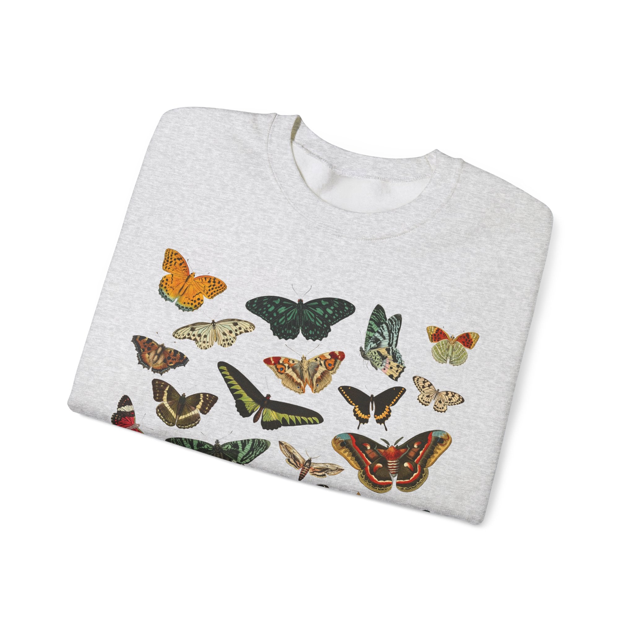 Folded gray sweatshirt with colorful butterfly patterns on a white background