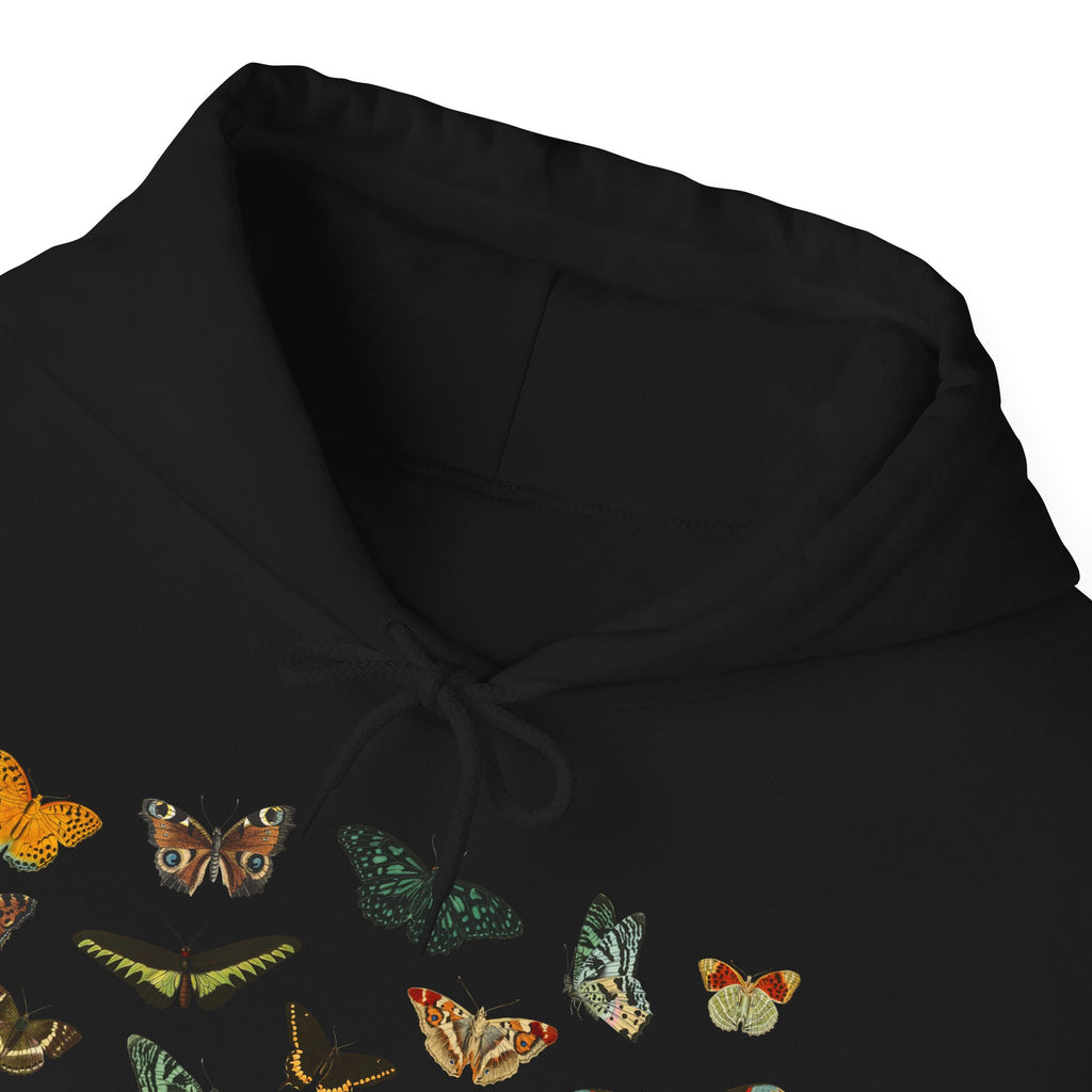 Close up of a Black hoodie with butterfly designs on a white background