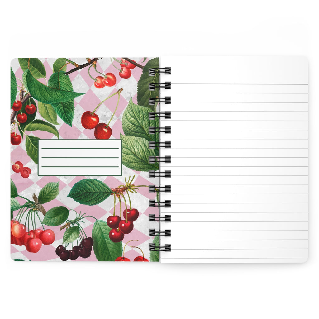 Inside front cover of Notebook with cherry and leaf design on a pink checkered background