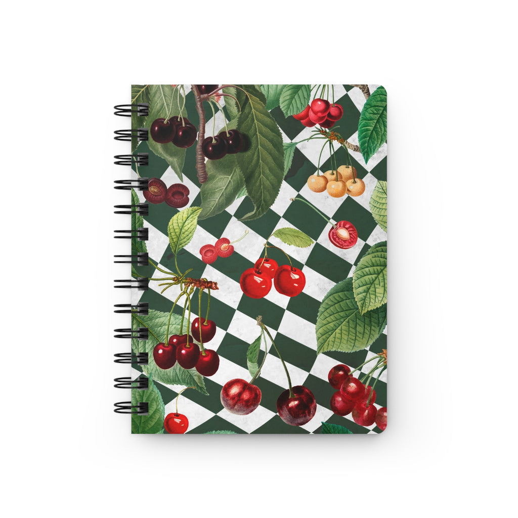 A green checkered background with cherry pattern spiral notebook. 5x7" journal