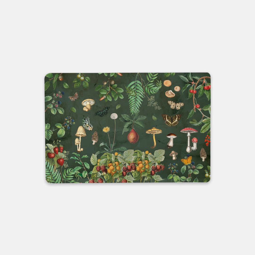 Rectangular Desk mat with nature-themed design featuring plants, mushrooms, and fruits on a dark green background.