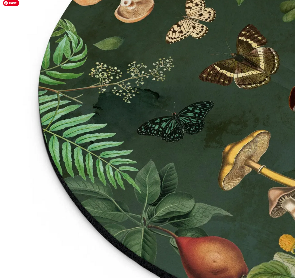Round mouse pad with nature-themed design including leaves, mushrooms, and butterflies on a dark green background.