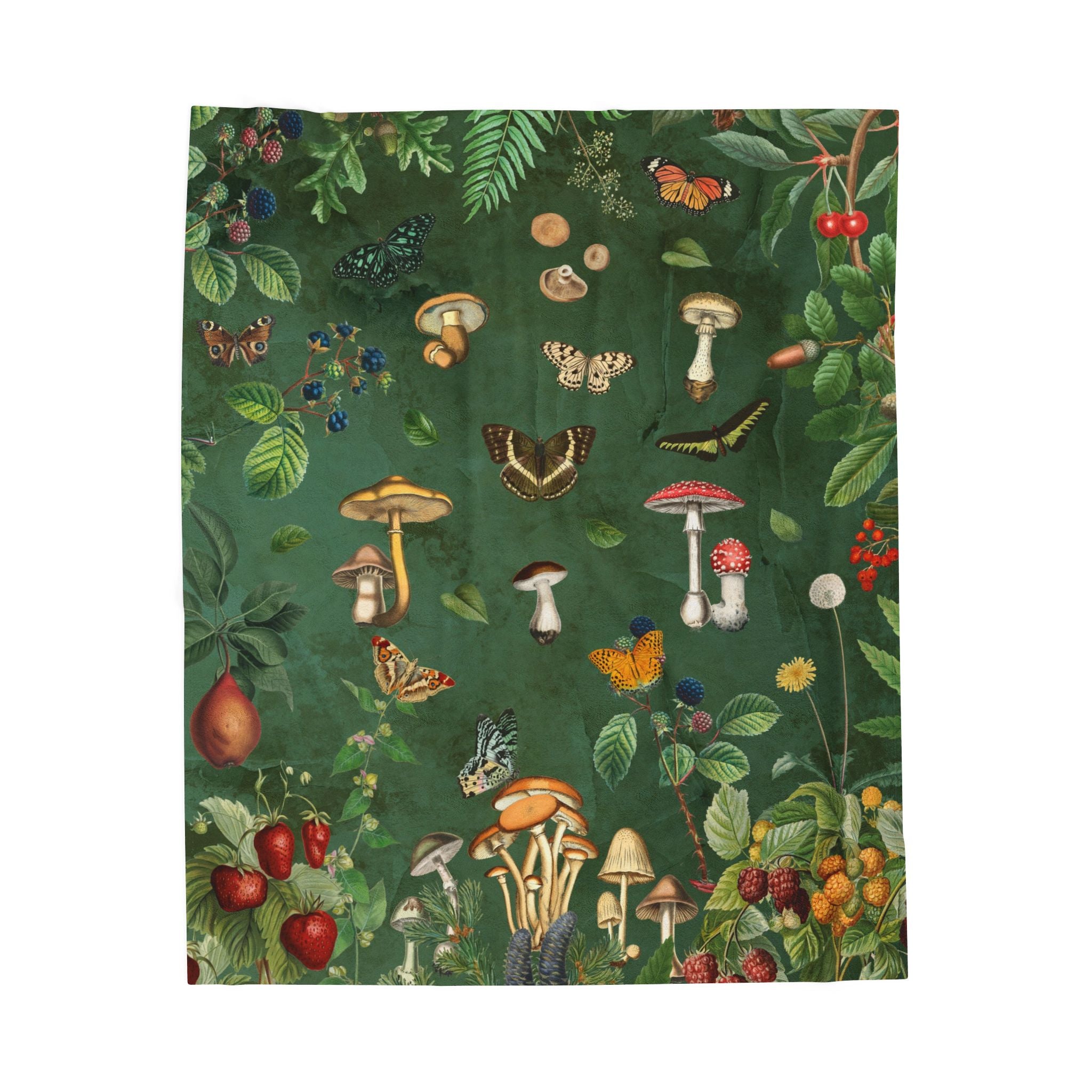 Cottagecore mushroom throw blanket with vintage forest illustrations, butterflies, berries, and greenery on a deep green background
