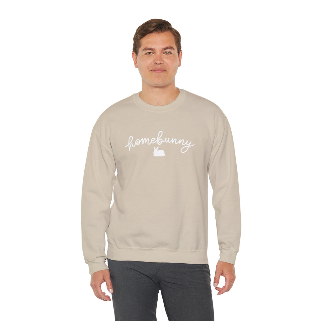 Man wearing a Sand beige sweatshirt with 'homebunny' text on a white background