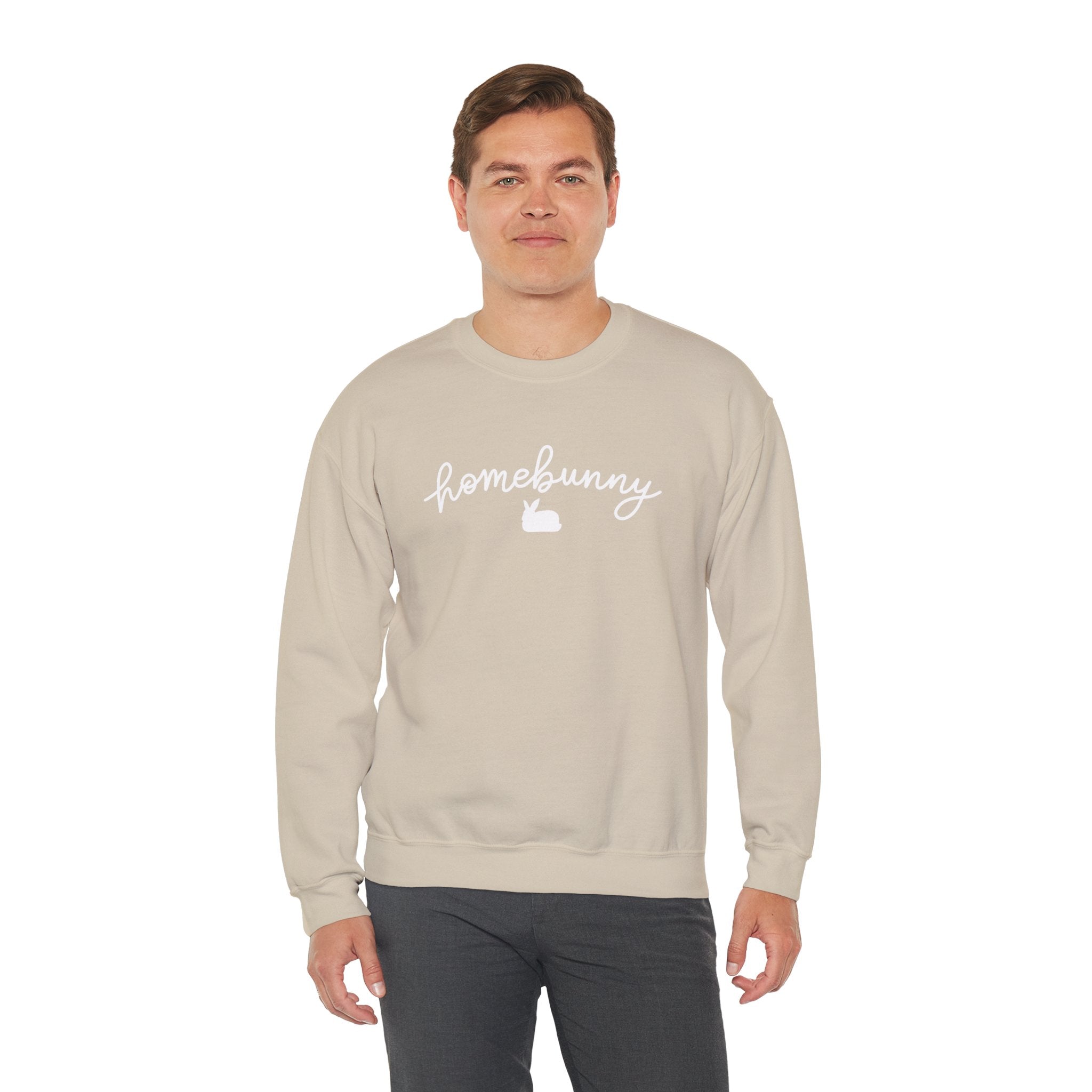 Man wearing a Sand beige sweatshirt with 'homebunny' text on a white background