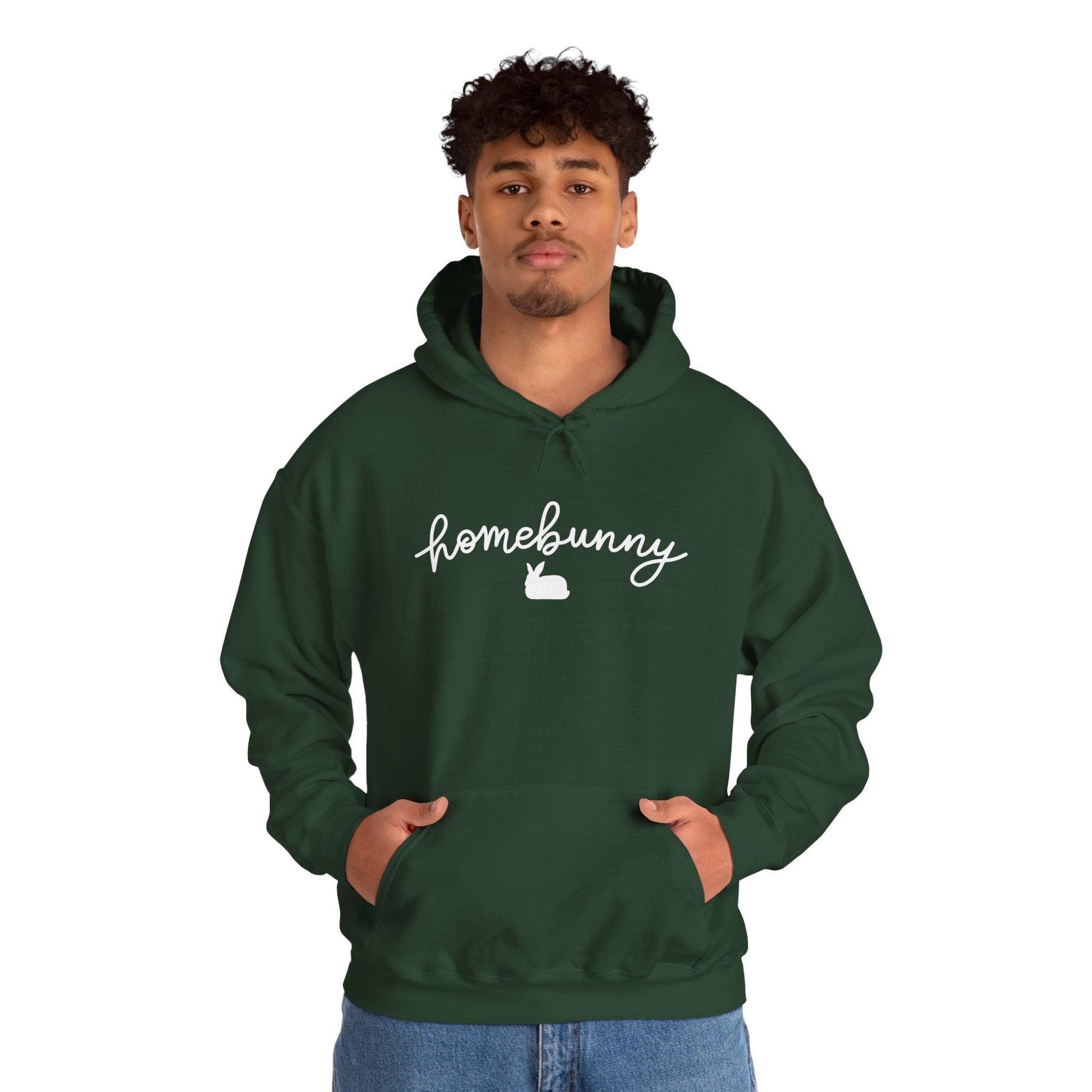Person wearing a forest green hoodie with 'homebunny' text on a white background
