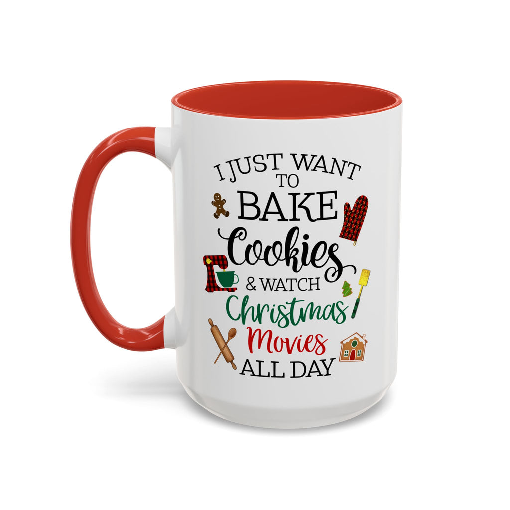 White ceramic coffee mug with red interior and handle featuring the quote “I Just Want to Bake Cookies & Watch Christmas Movies All Day,” decorated with holiday baking icons.