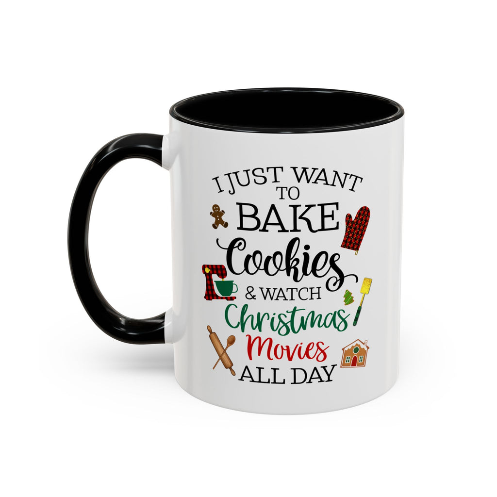 White 11 oz mug with black handle and inside featuring a holiday quote “I Just Want to Bake Cookies & Watch Christmas Movies All Day” in red, green, and black lettering.