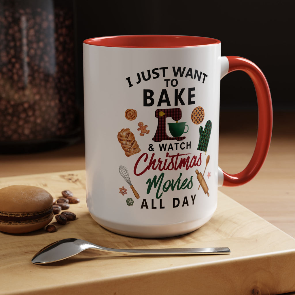 Mug with text 'I just want to bake & watch Christmas movies all day' on a wooden surface with cookies and coffee beans. Red handle and interior 15 oz mug.