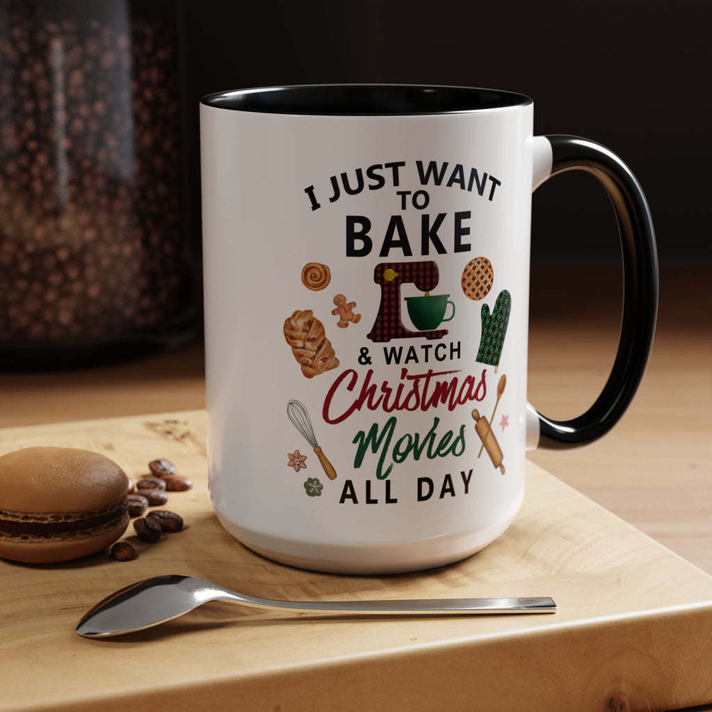 White mug with black interior and handle, featuring text and graphics on a wooden surface with cookies and coffee beans.