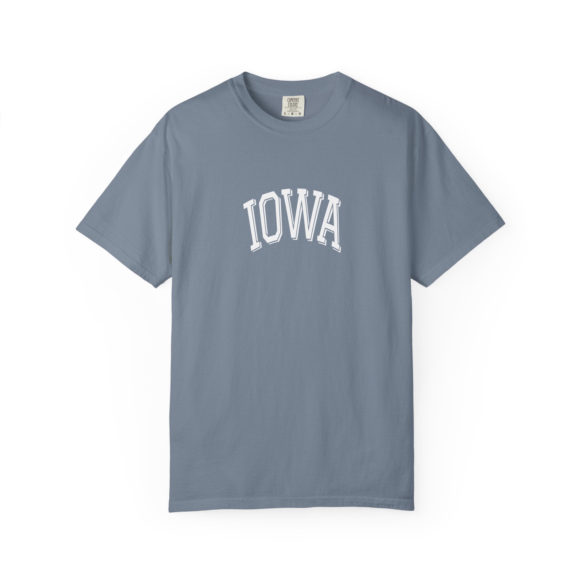 Blue Jean Comfort Colors t-shirt with 'Iowa' printed on it against a white background
