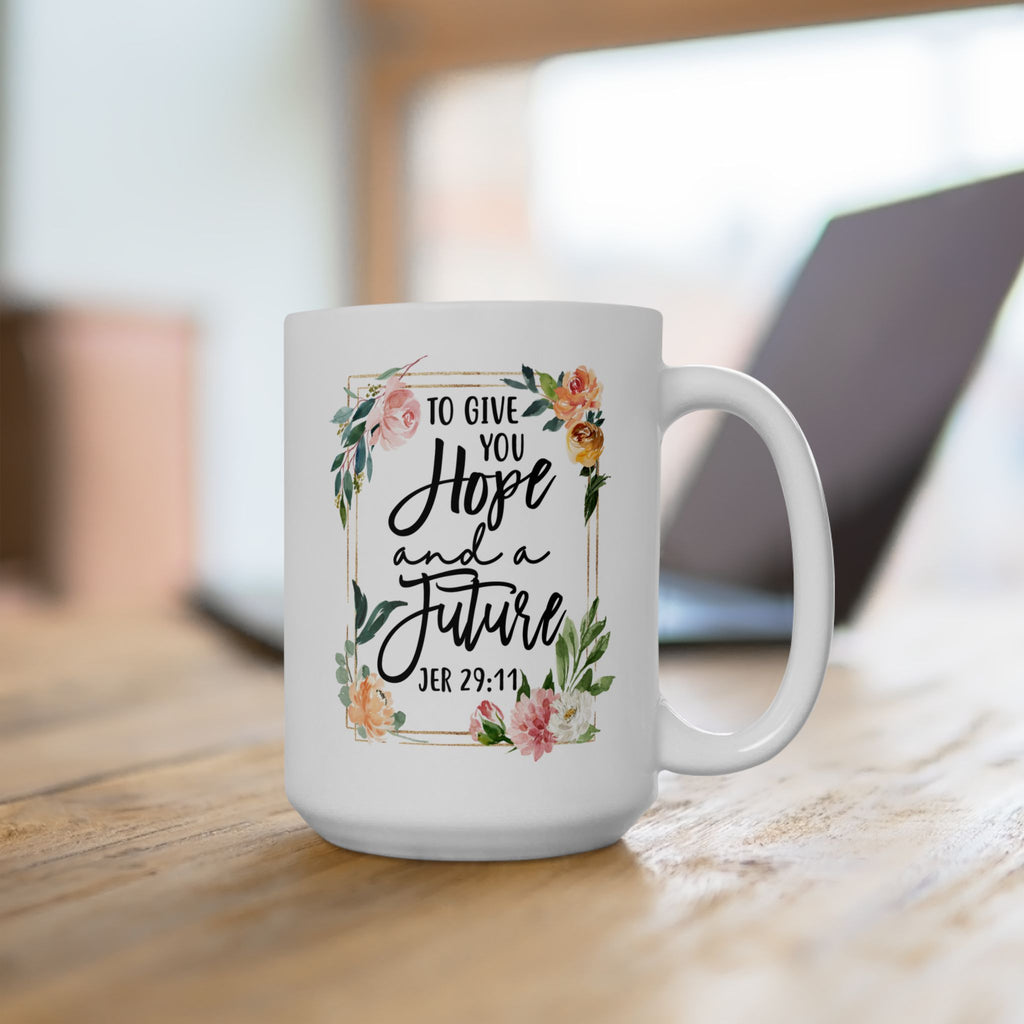 White mug with floral design and text on a wooden surface Jeremiah 29:11