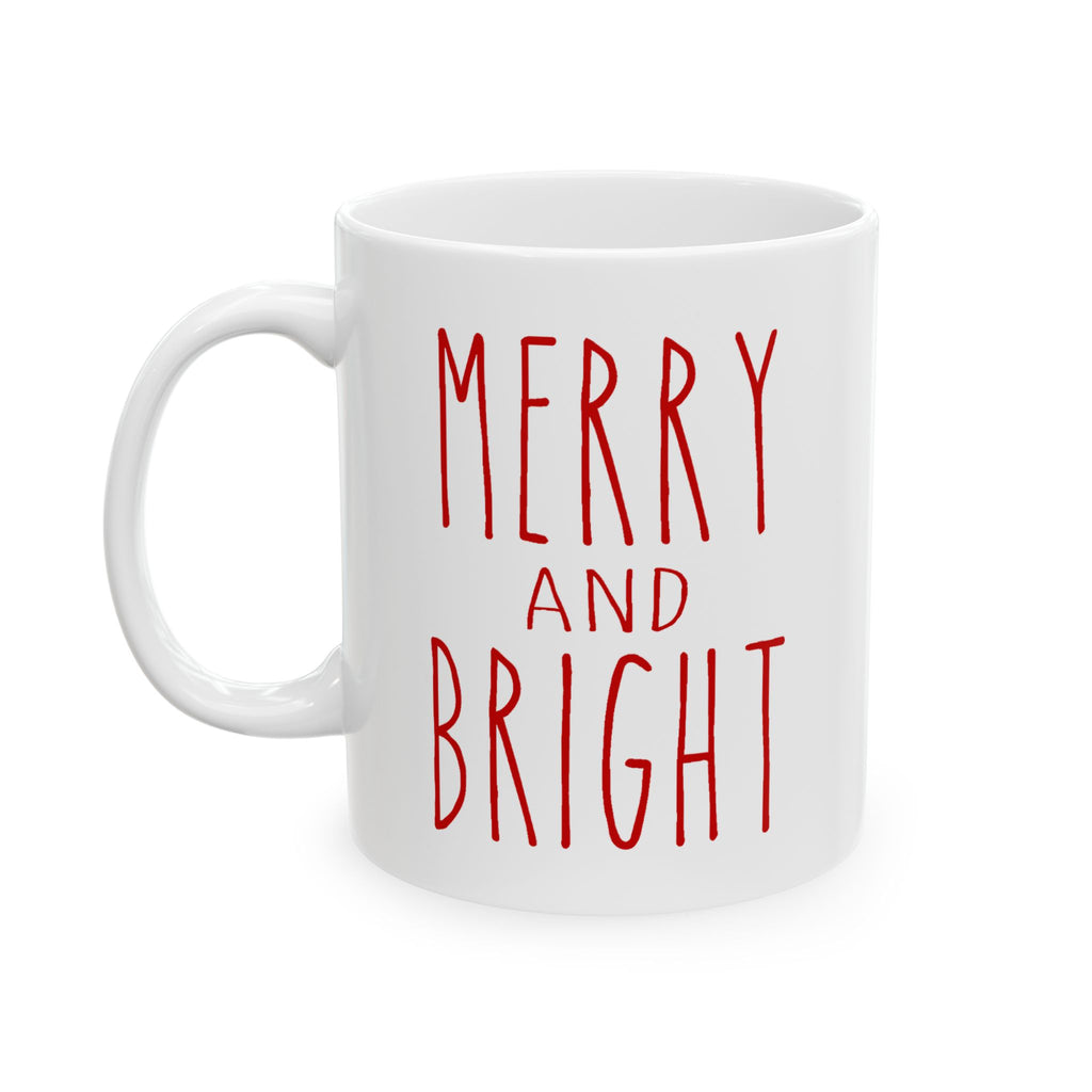White mug with 'Merry and Bright' text in red on a white background