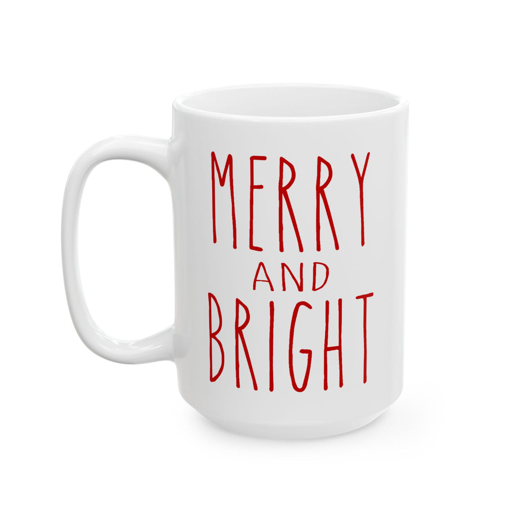 White 15 oz mug with 'Merry and Bright' text in red on a white background