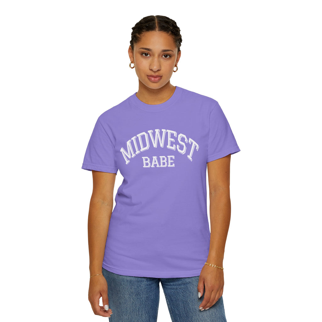 Person wearing a Voilet t-shirt with 'MIDWEST BABE' text on a white background