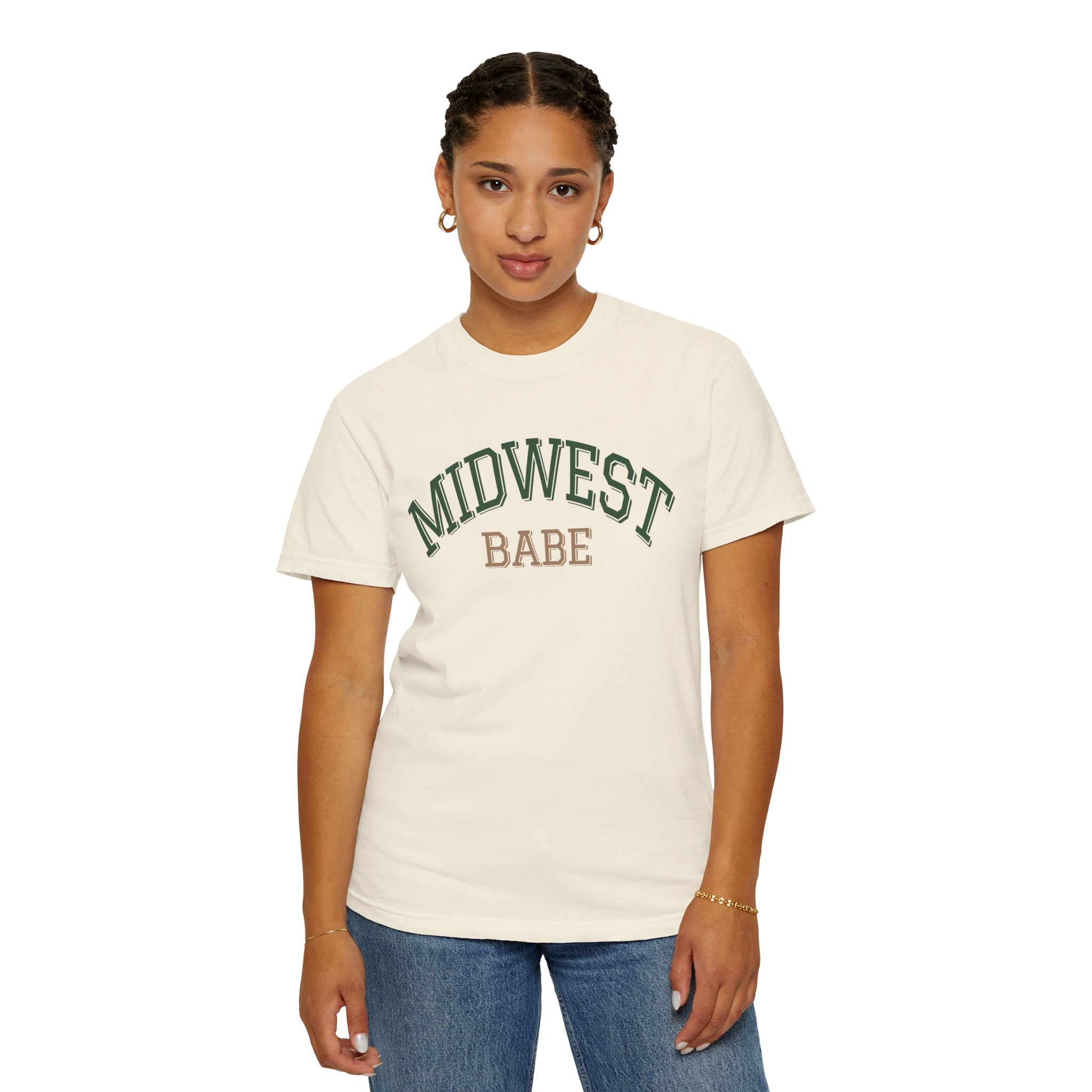 Person wearing an Ivory Comfort Colors t-shirt with 'Midwest Babe' text on a white background