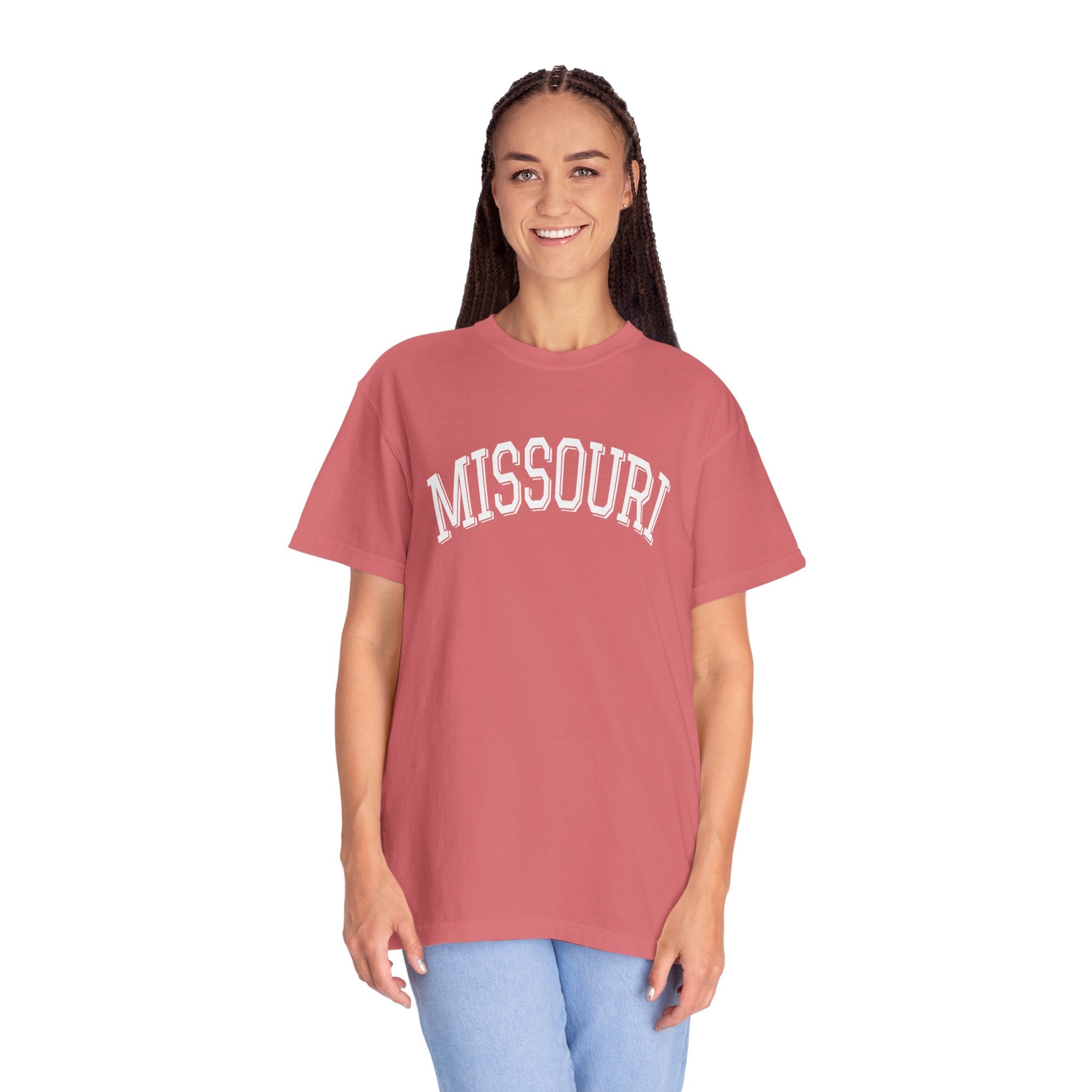 Person wearing a red soft 'MISSOURI' t-shirt in color Watermelon on a white background