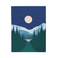 Mountain landscape with trees and a moonlit sky on a blue background