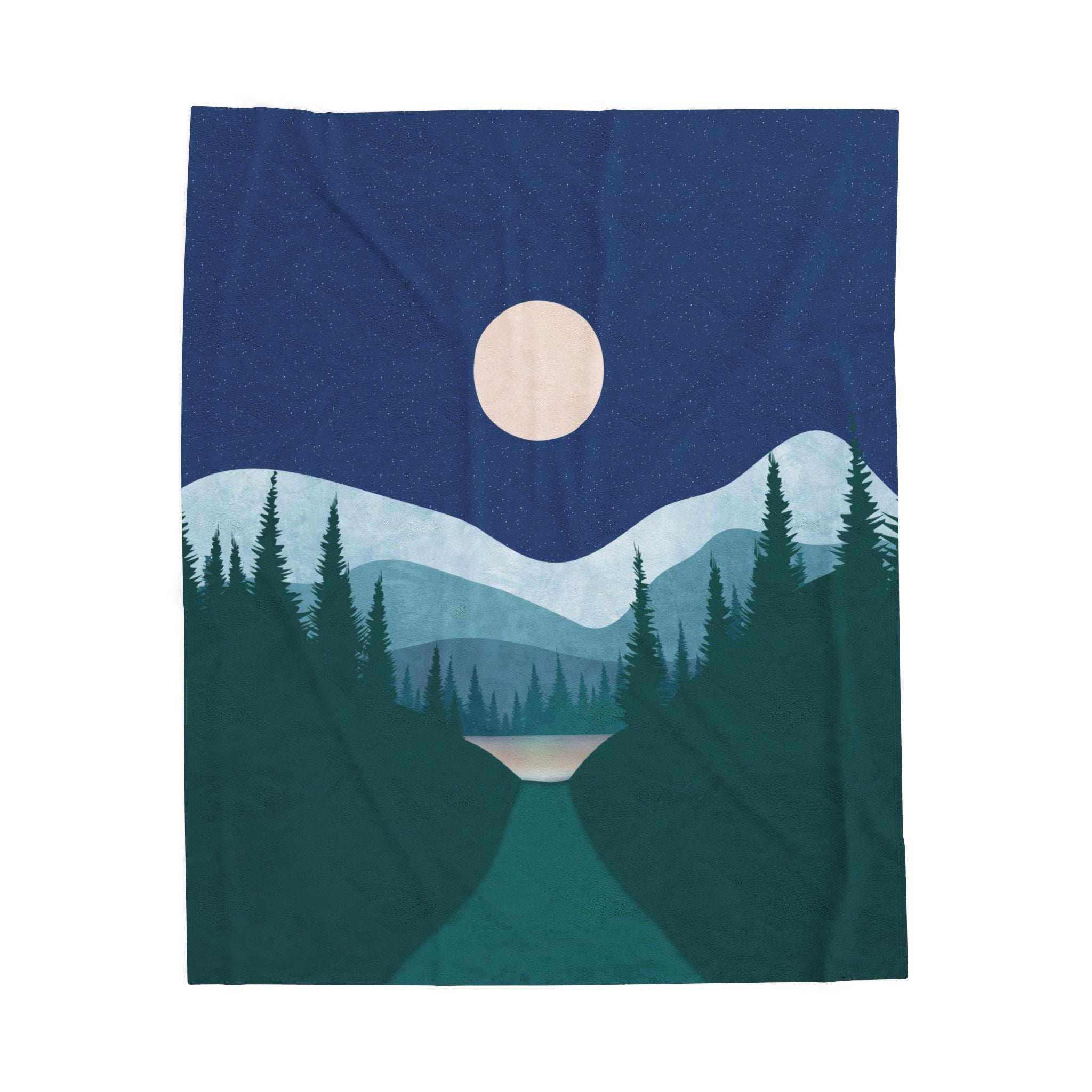 Velveteen plush blanket with mountain and forest design on a blue background