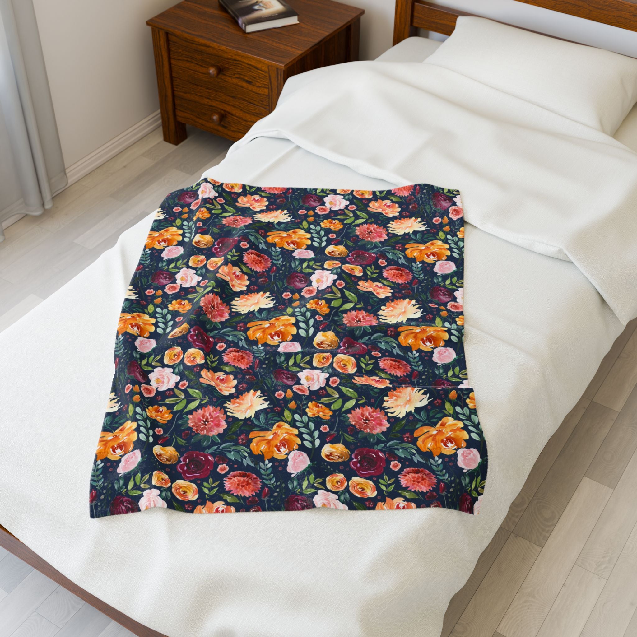 Floral patterned blanket on a bed in a bedroom setting. 30x40 inch