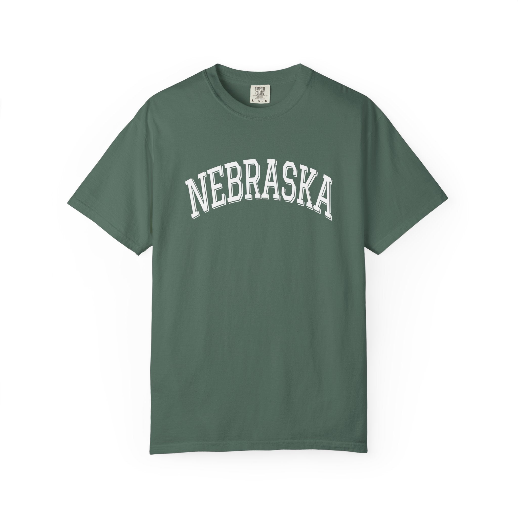 Blue Spruce t-shirt with 'NEBRASKA' printed on it against a white background