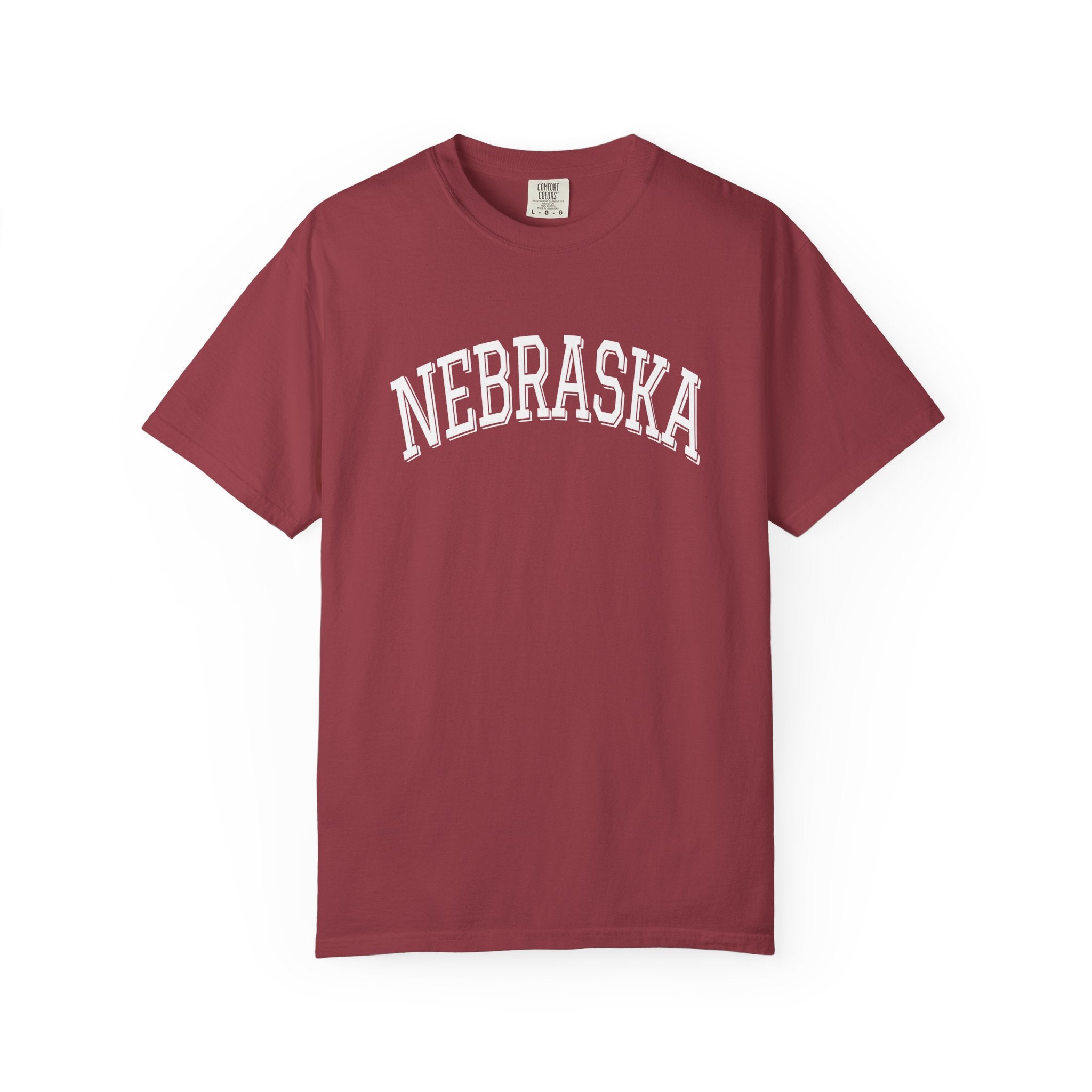 Comfort Colors Chili t-shirt with 'NEBRASKA' printed on it against a white background