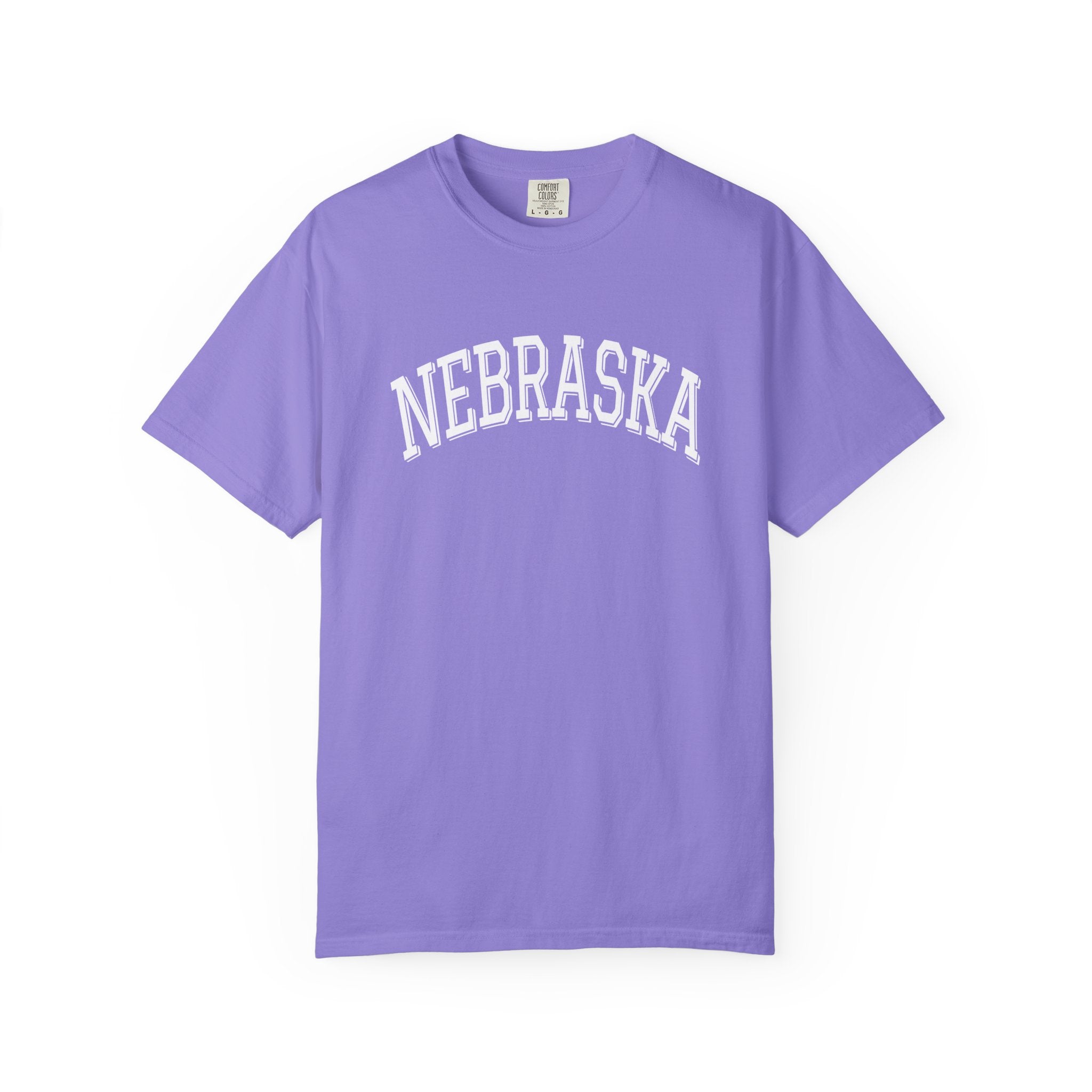 Violet t-shirt with 'NEBRASKA' printed on it against a white background